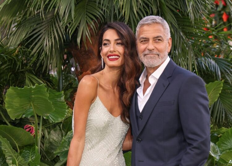 جورج كلوني وزوجته امل علم الدين يكشفان سرًا خطيرًا عن ابنهما