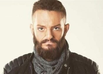 أويس مخللاتي يوضح حقيقة اعتناقه الديانة المسيحية